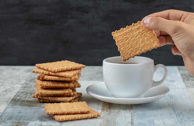 Dunking Biscuits In Tea 